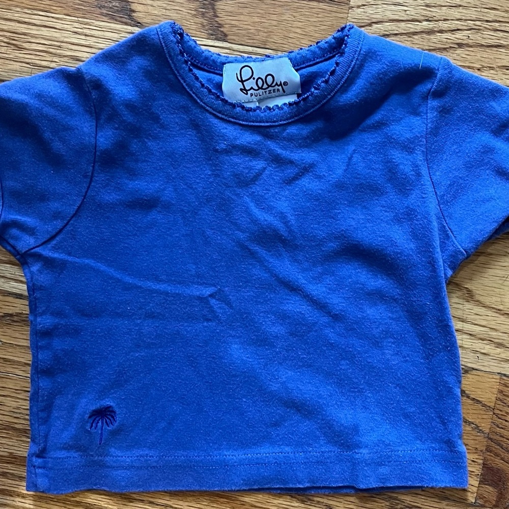 Lilly Pulitzer girl’s t-shirt (2T) blue shirt sleeve. Lilly palm tree logo